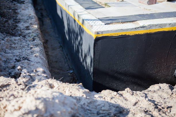 Professional Wet Basement Repair technician working in Wilmington, IL